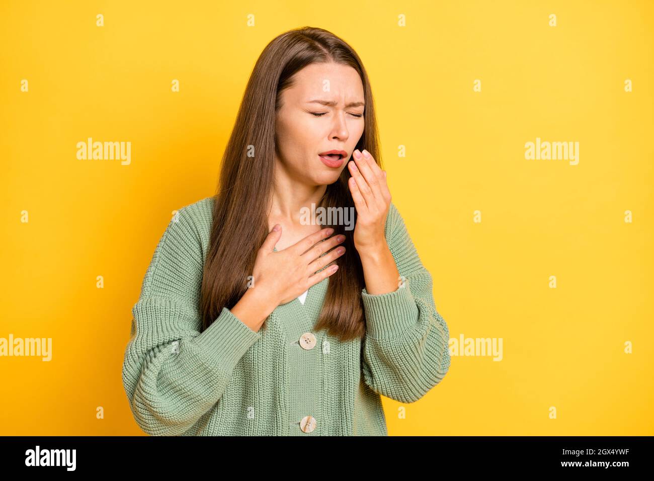 Hands covering chest woman hires stock photography and images Alamy
