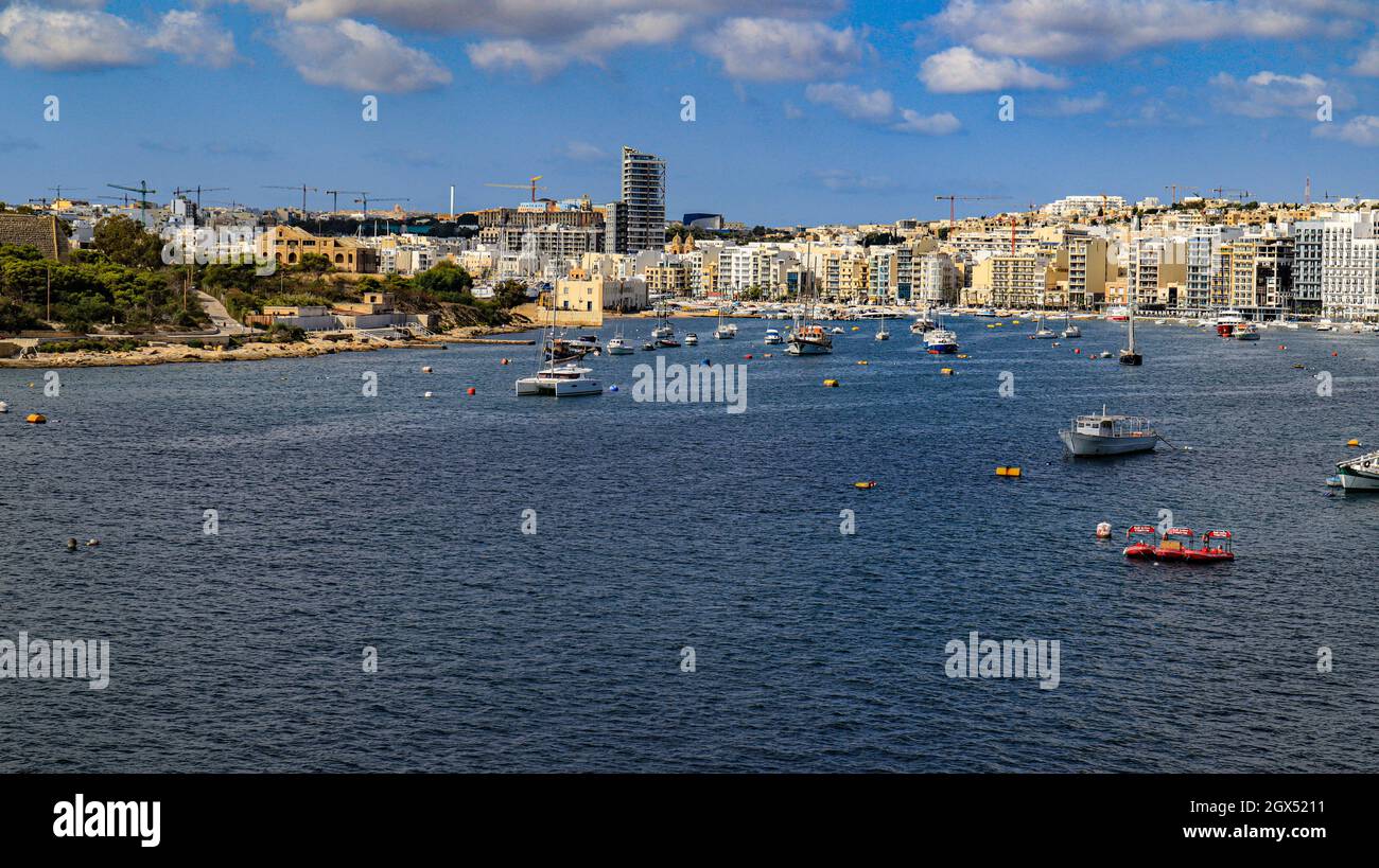 Boats at their moorings in Sliema Creek, Sliema on the Mediterranean island of Malta , during the Covid 19 pandemic Stock Photo