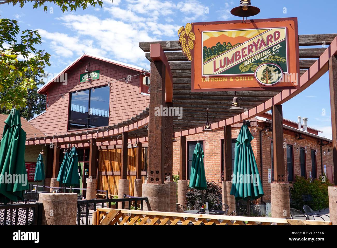 Microbrewery in a former lumberyard building featuring a taproom, eatery and patio with a fire pit, Flagstaff, Arizona, USA. Stock Photo