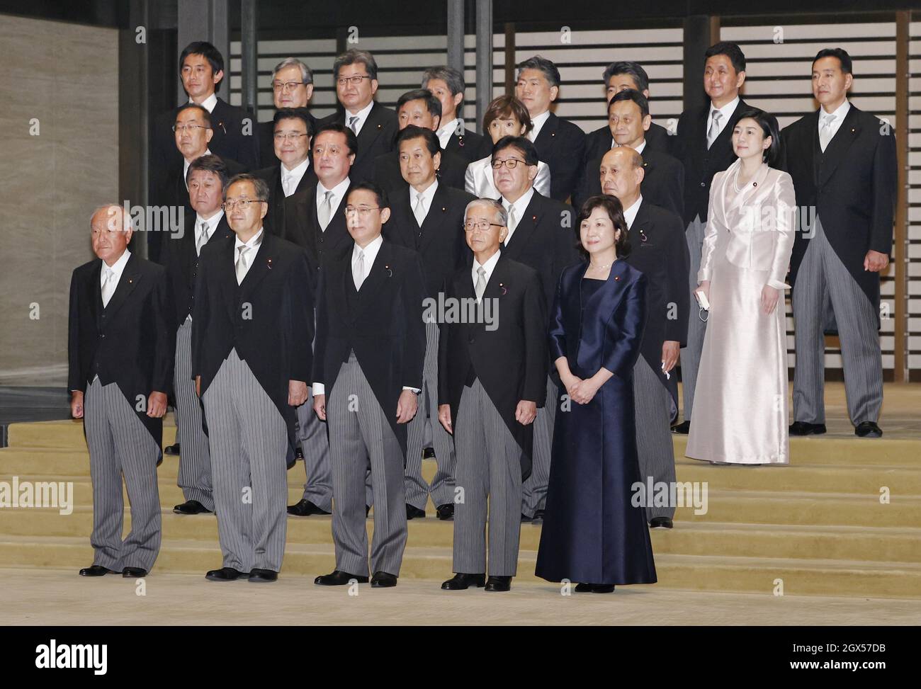 Japan's new Prime Minister Fumio Kishida (front, C) and his Cabinet ...