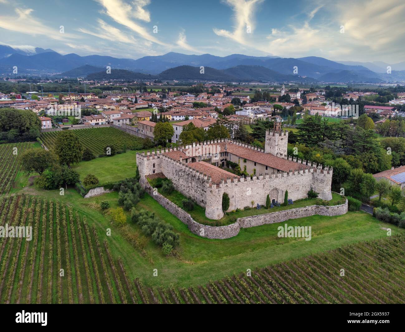 Aerial View Of A Medieval Castle Surrounded By Vineyards In The 