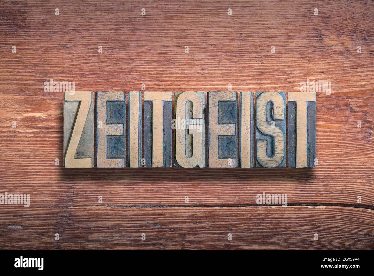 zeitgeist word combined on vintage varnished wooden surface Stock Photo