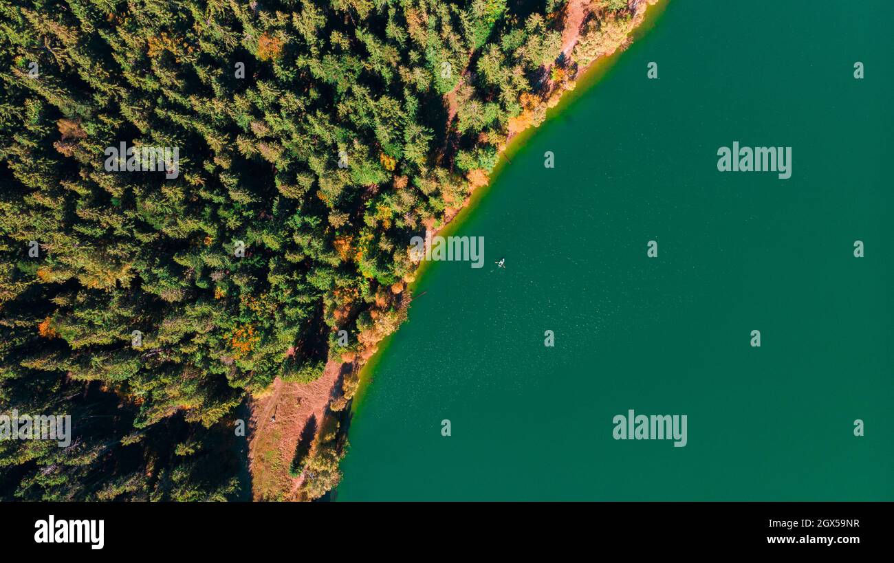 Aerial top down drone view of the fall over Saint Anne (Sfanta Ana ...