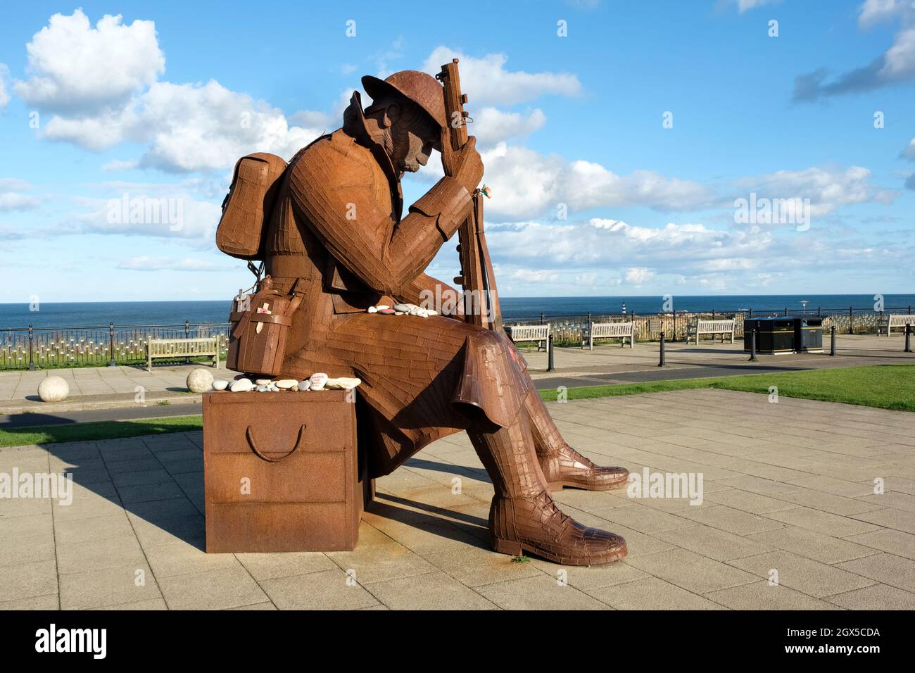 Tommy (Eleven 'O' One), corten steel statue of a First World War soldier by Ray Lonsdale, Seaham war memorial, Terrace Green, Seaham, Co. Durham, UK Stock Photo