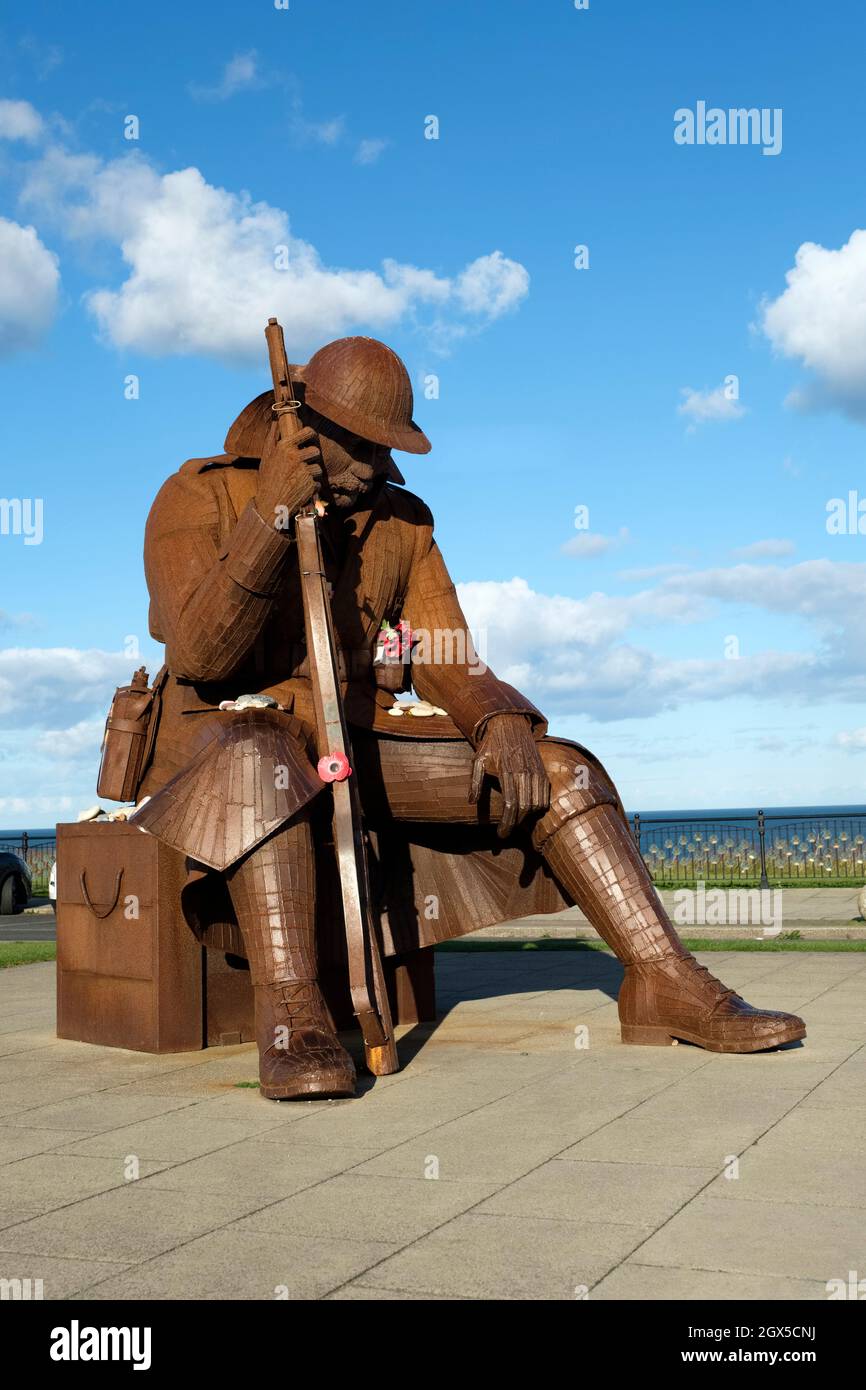 Tommy (Eleven 'O' One), corten steel statue of a First World War soldier by Ray Lonsdale, Seaham war memorial, Terrace Green, Seaham, Co. Durham, UK Stock Photo