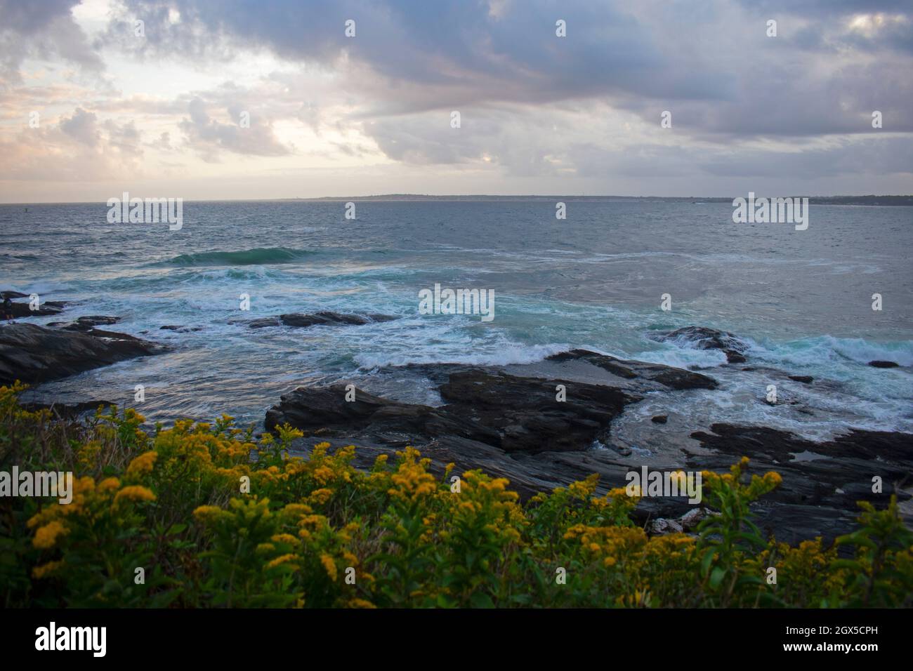 Ocean waves crashing into rocky shore line at Jamestown, Rhode Island -05 Stock Photo