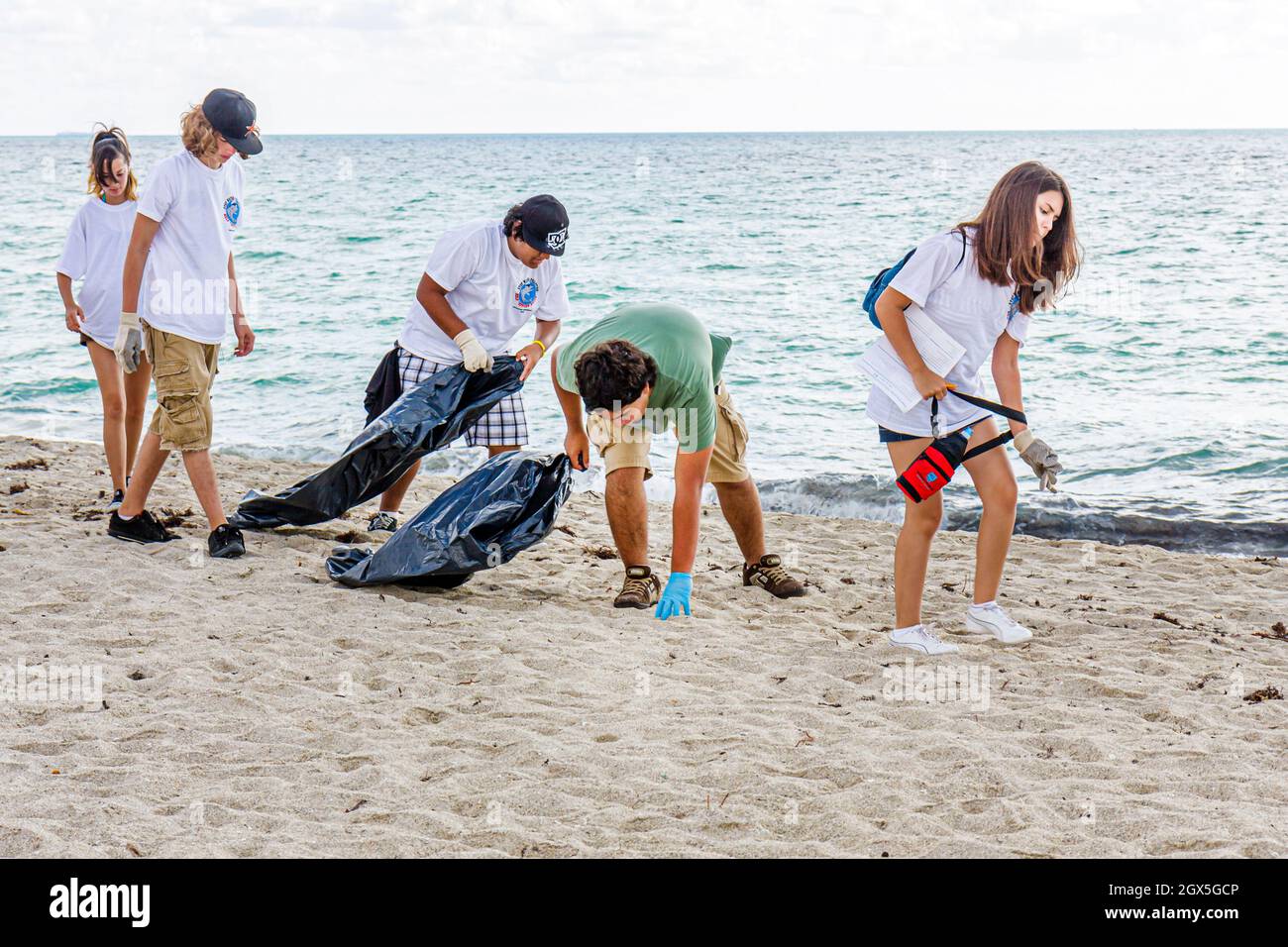 Miami Beach Florida,Coastal Cleanup,volunteers volunteering students
