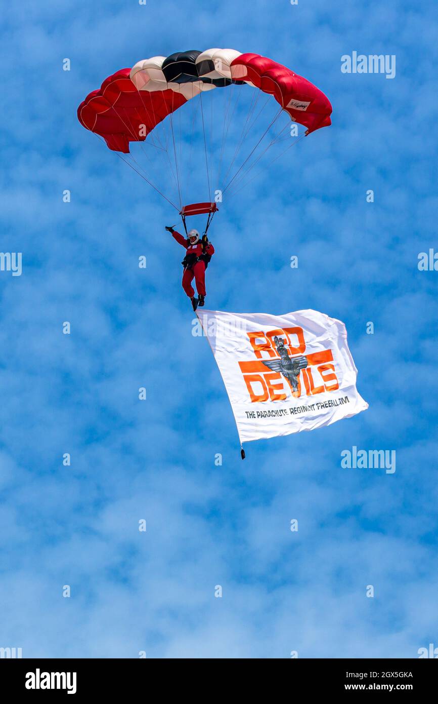 A Red Devils sky diving skydiving Display in Dorset Stock Photo