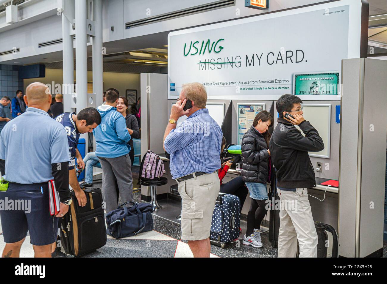 Chicago Illinois,O'Hare International Airport,gate travelers,American Express lost credit card replacement advertising ad Stock Photo