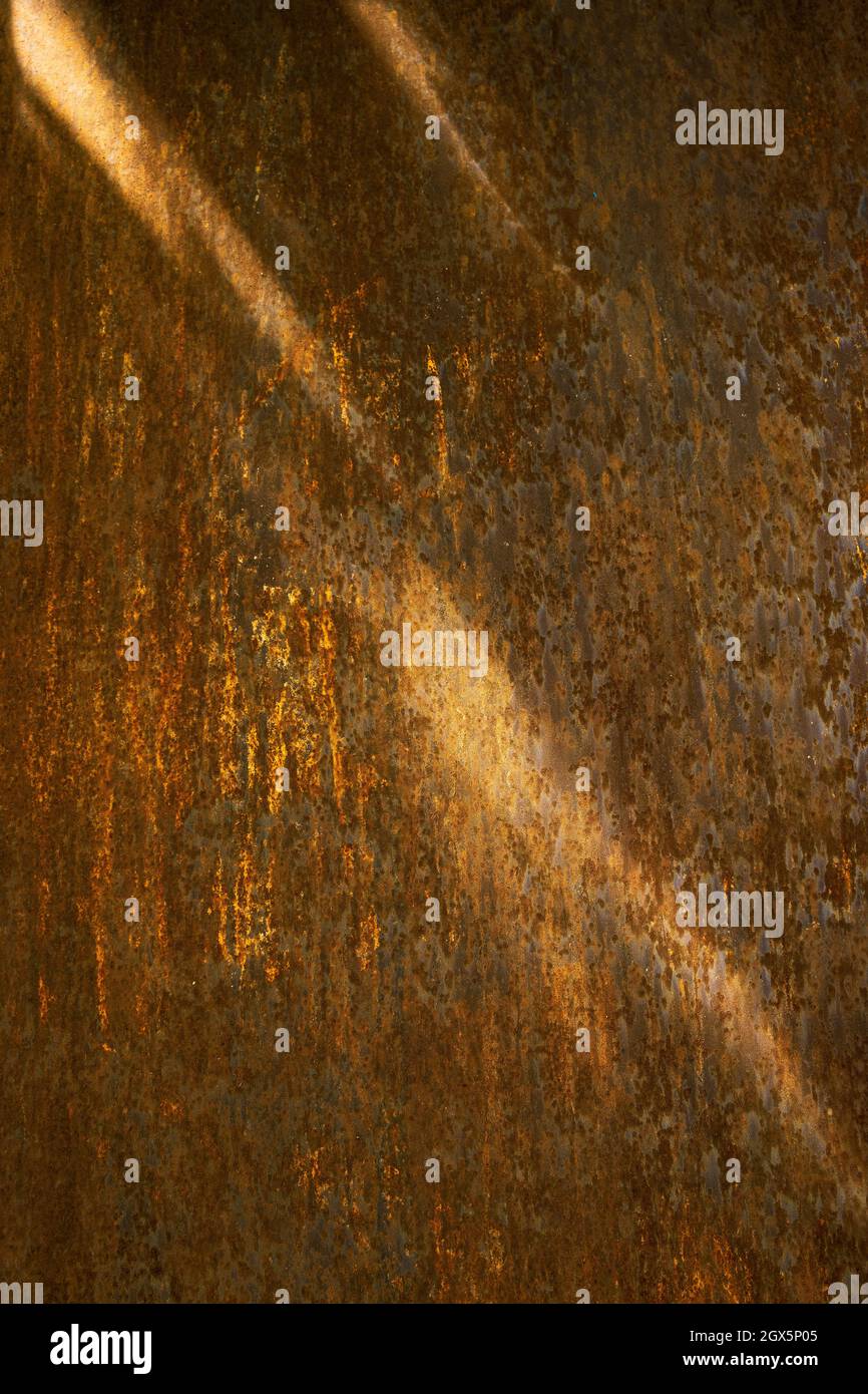 Rusty texture with rays of sunlight. Rusty texture background Stock ...