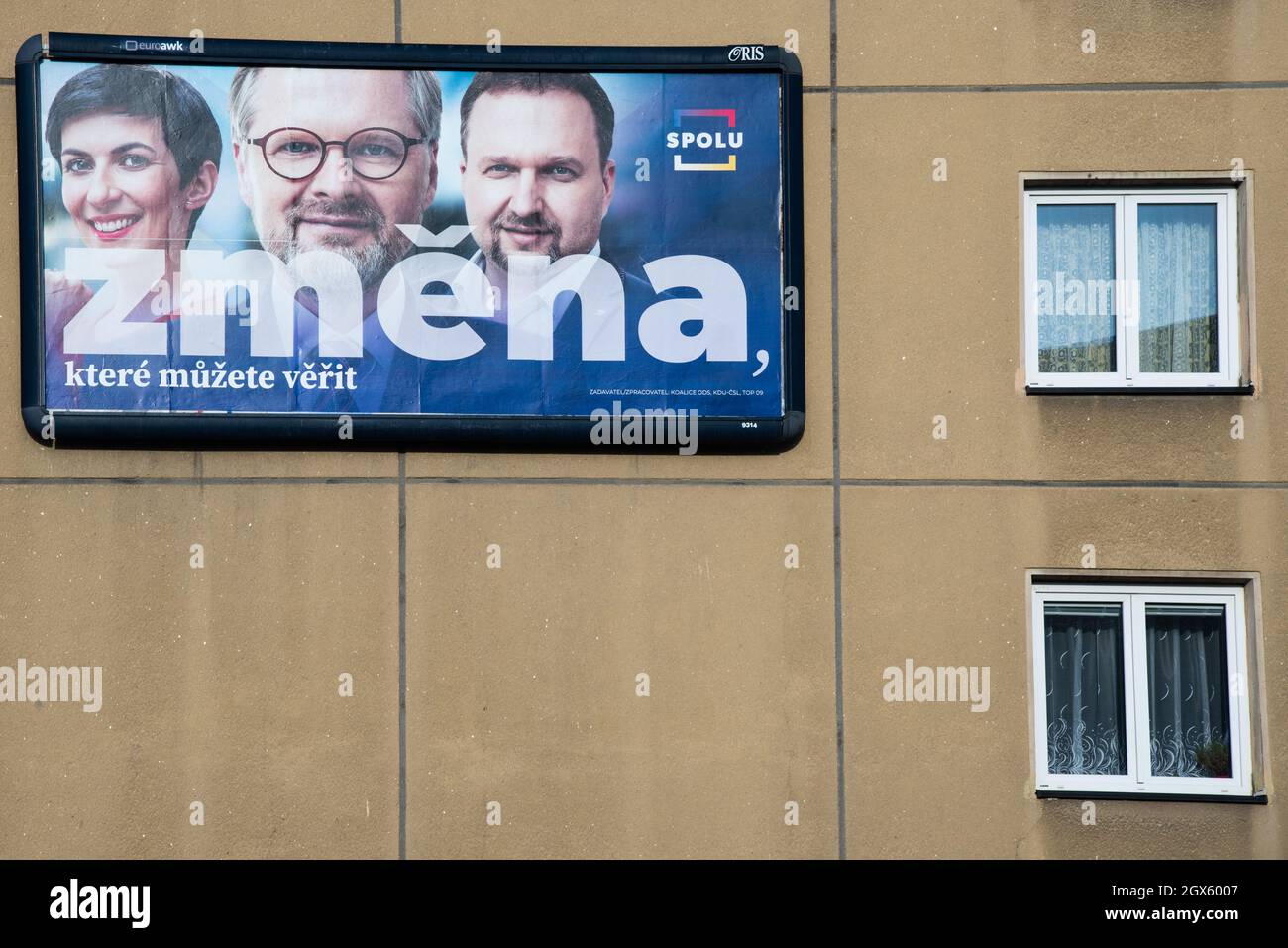 Election billboard for coalition SPOLU placed on the building of the  Prague. On the billboard (from left to right) the leaders of coalition  Marketa Pekarova Adamova from TOP09 party, Petr Fiala from