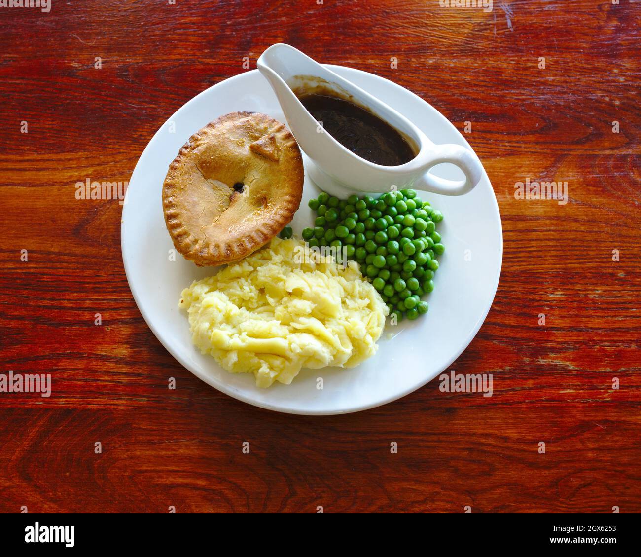 Traditional English meal pie and mashed potato Stock Photo