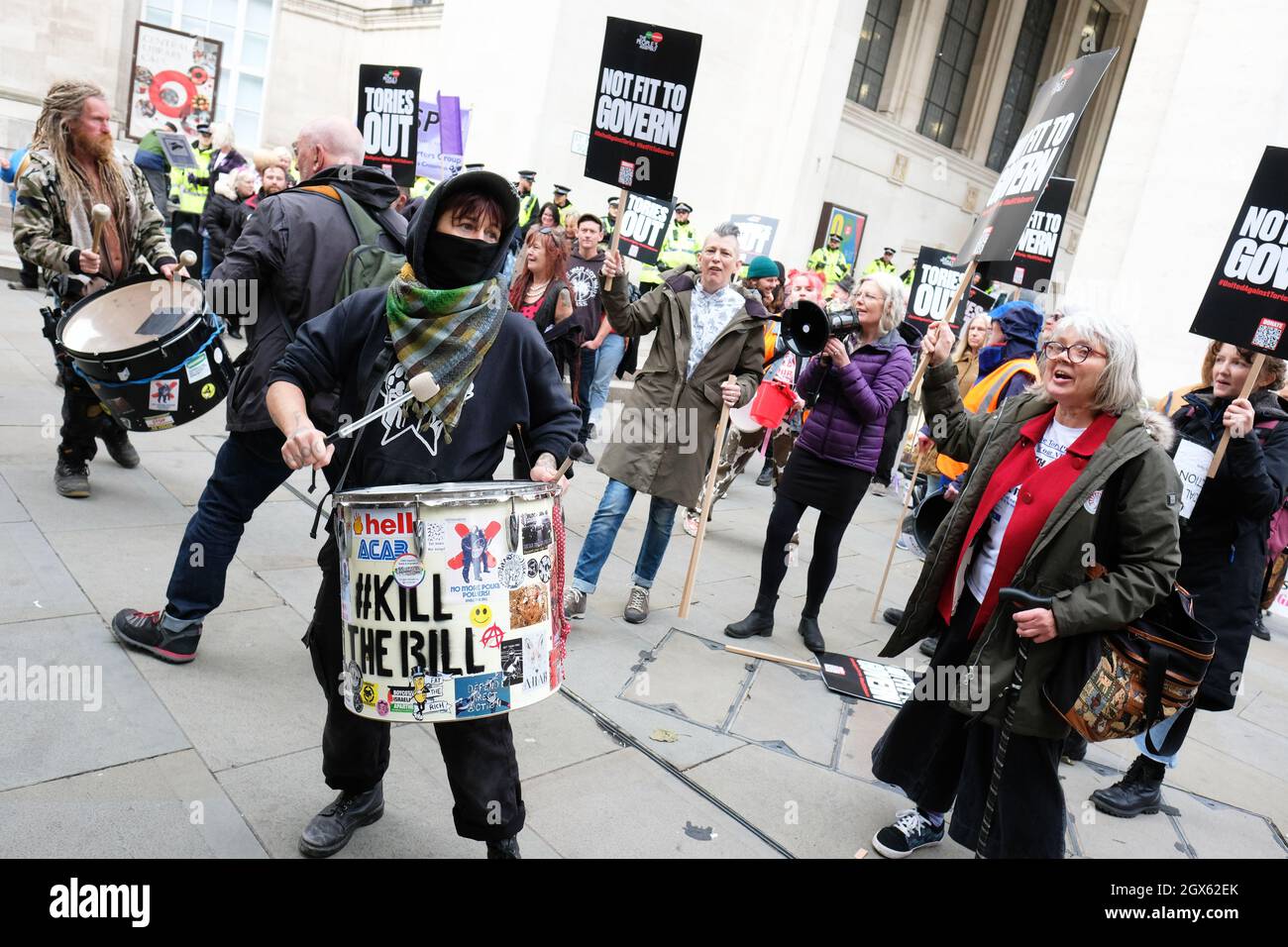 Manchester, UK – Monday 4th October 2021 – Kill the Bill and Anti Tory protesters outside the Conservative Party Conference in Manchester with Tories Out and Not Fit to Govern placards. Photo Steven May / Alamy Live News Stock Photo