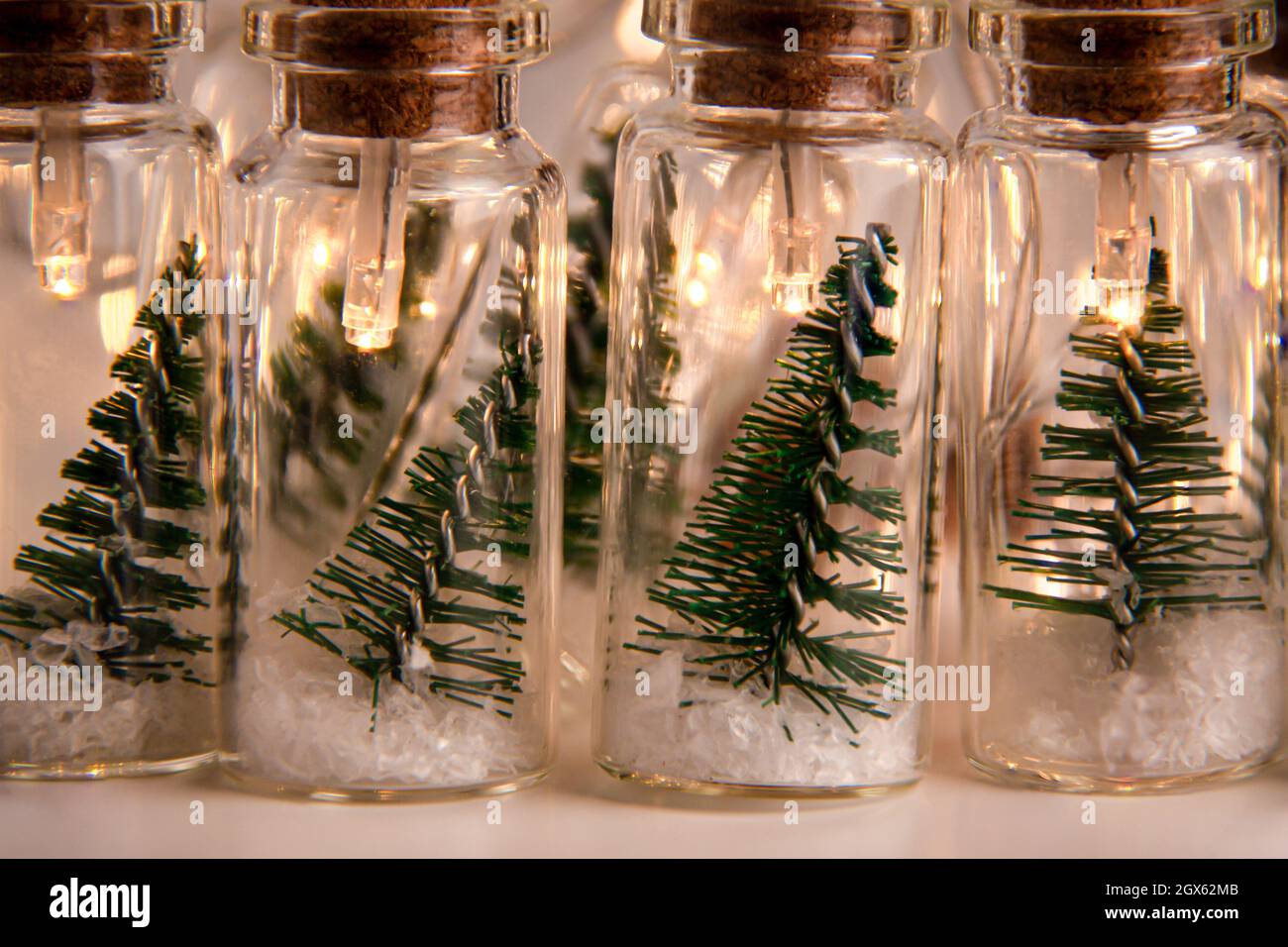 Close up of glowing lights decoration of glass jars with corks inside