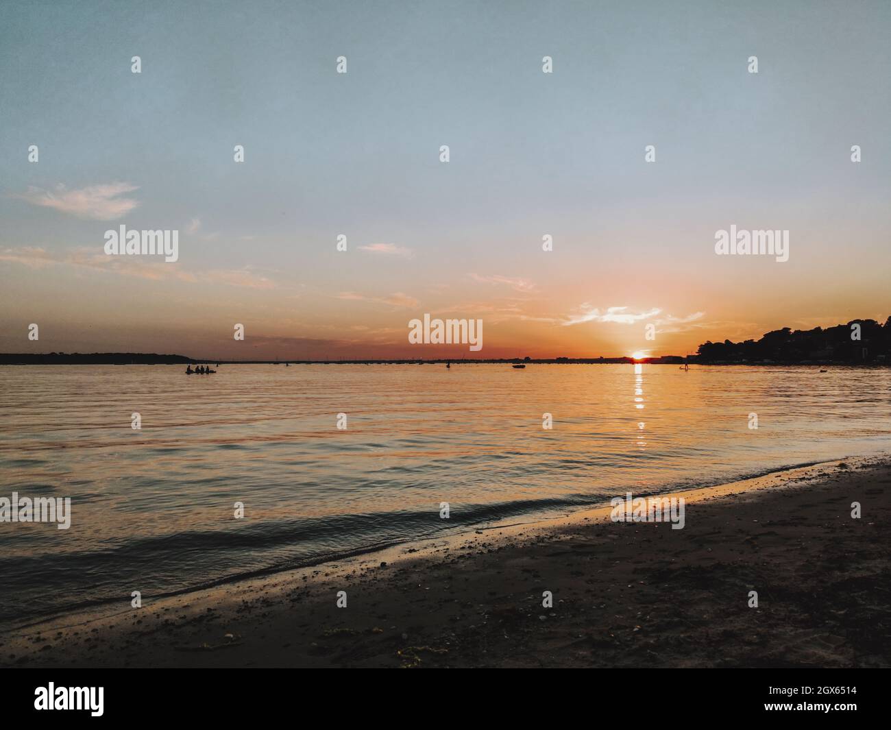Beautiful sunset at the beach Stock Photo - Alamy
