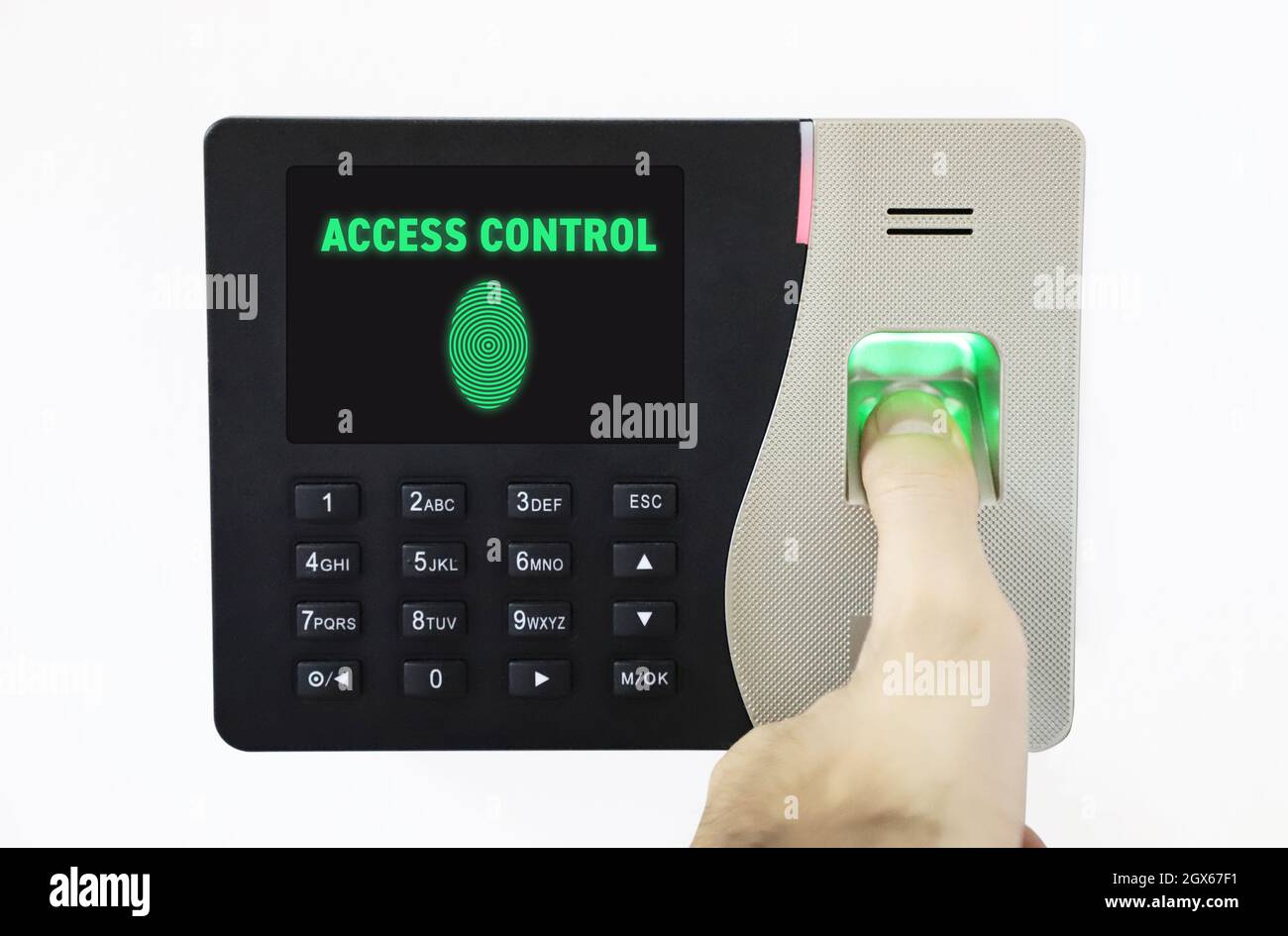 isolated biometric fingerprint scanner. thumb on fingerprint. access control write on black screen. Stock Photo