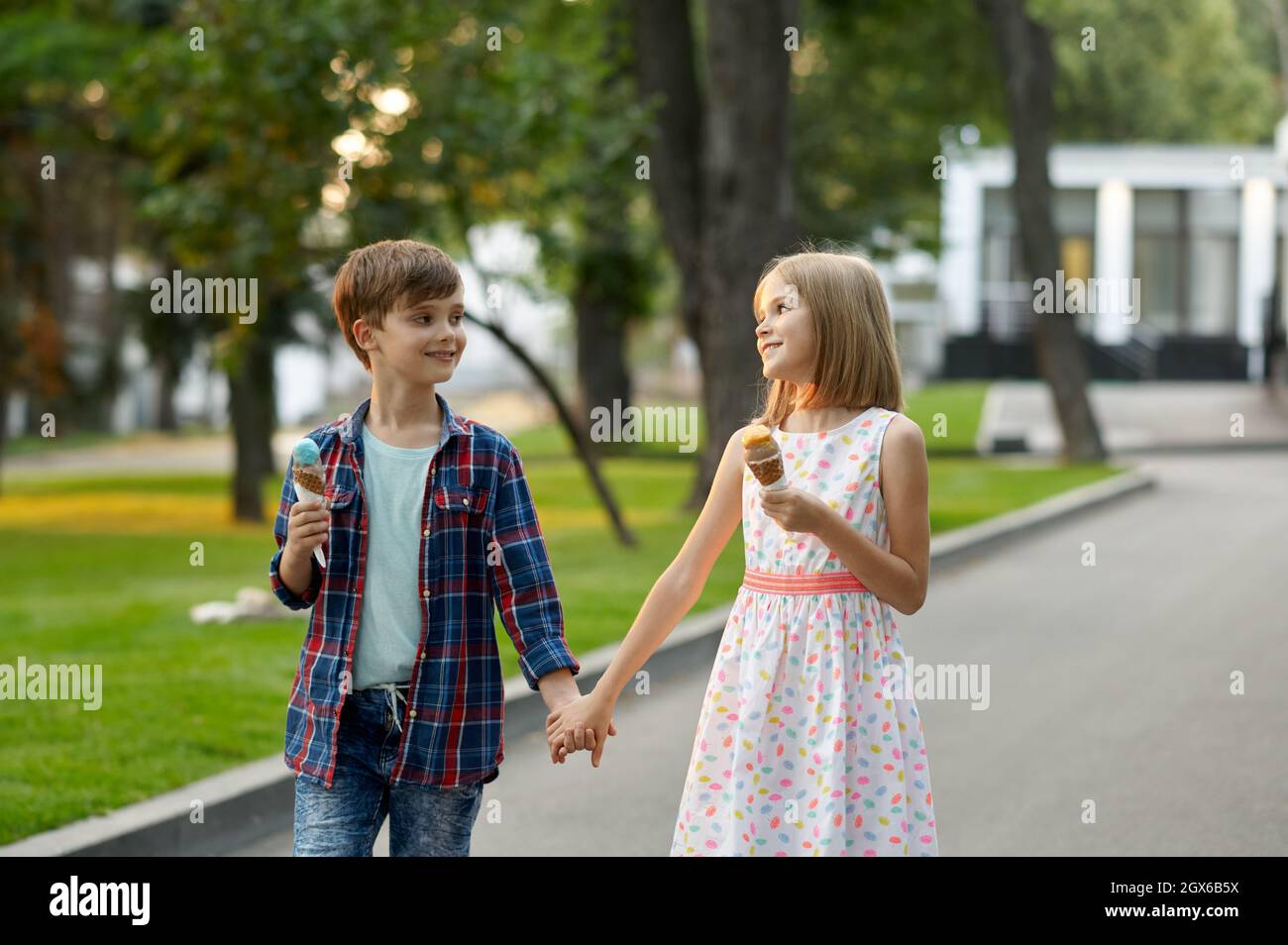 Children's date, boy and girl eating ice cream Stock Photo