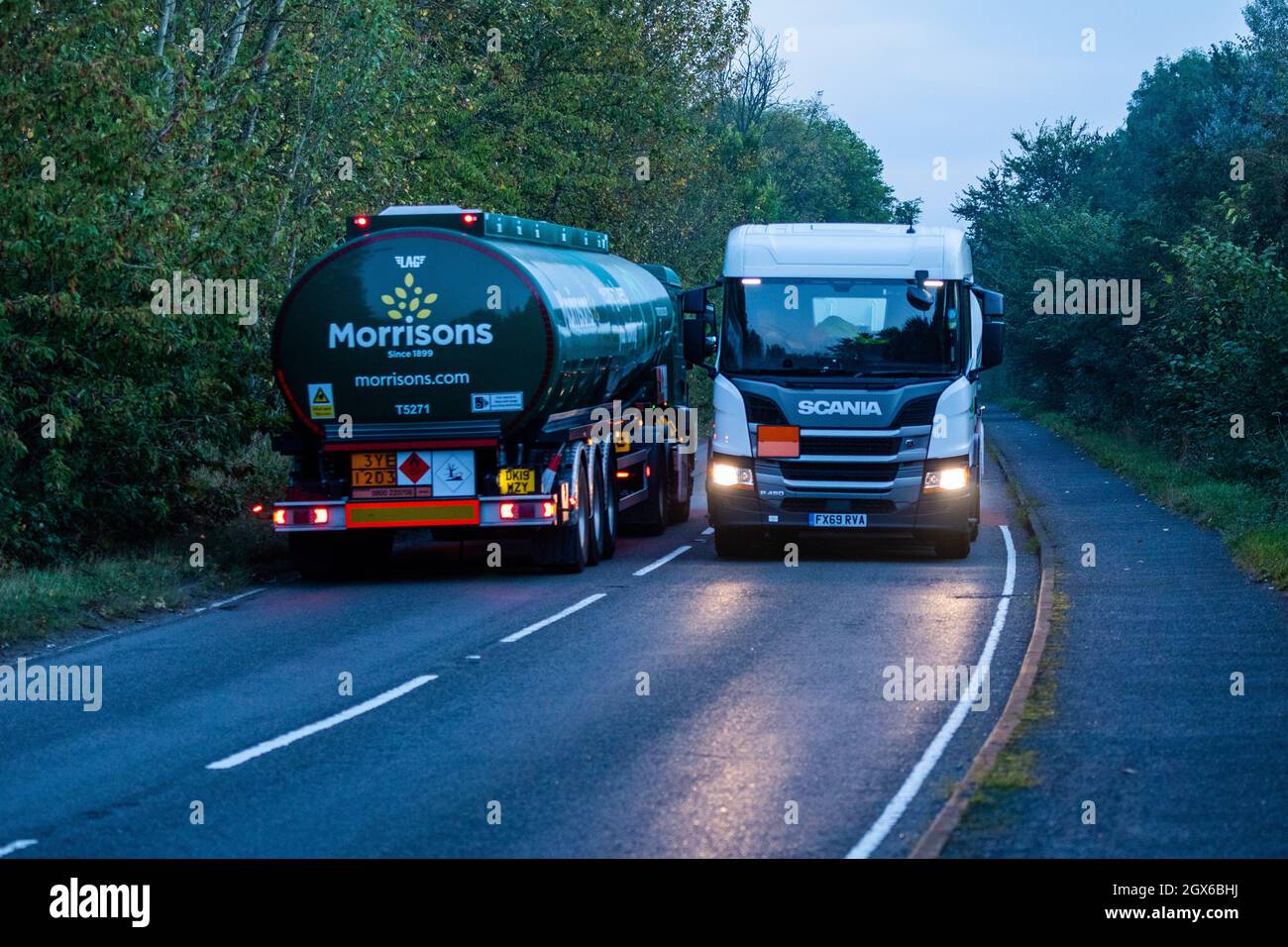 A Morrisons fuel tanker leaving the Kingsbury fuel depot as dawn breaks