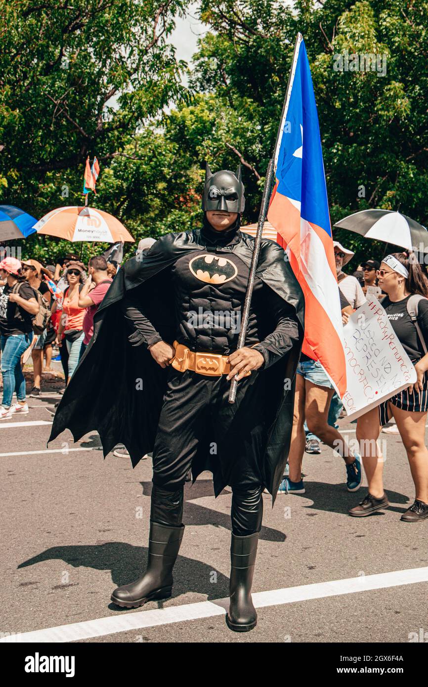 SAN JUAN, PUERTO RICO - Jul 23, 2019: A man wearing Batman clothes during  protests Demanding Ricardo Rosello Resignation in Puerto Rico Stock Photo -  Alamy