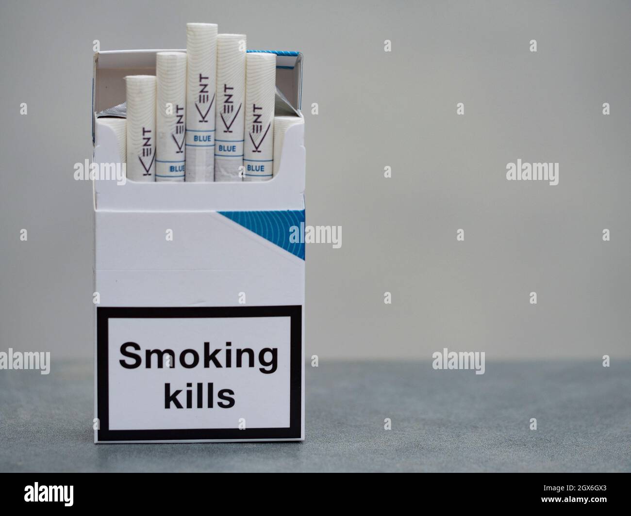 Kiev, Ukraine. 04th Oct, 2021. In this photo illustration, a pack of Kent Blue Cigarettes, made by British American Tobacco with a government warning 'Smoking Kills' seen displayed. Credit: SOPA Images Limited/Alamy Live News Stock Photo