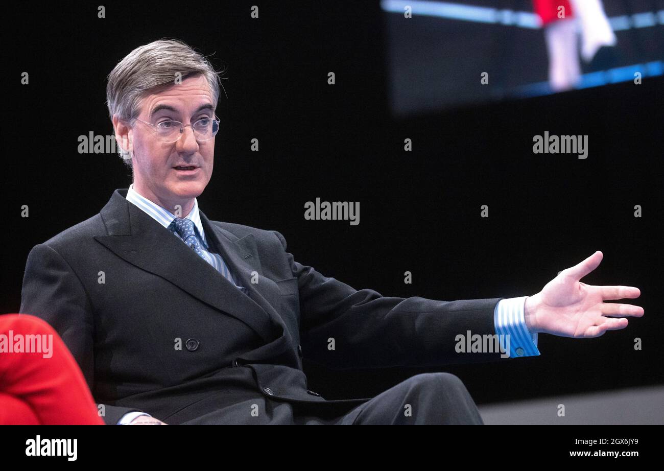 Manchester, UK. 4th Oct, 2021. Leader of the Commons, Jacob Rees-Mogg, chats at Conference. A lady outside the conference called him ‘Scum'. Credit: Mark Thomas/Alamy Live News Stock Photo