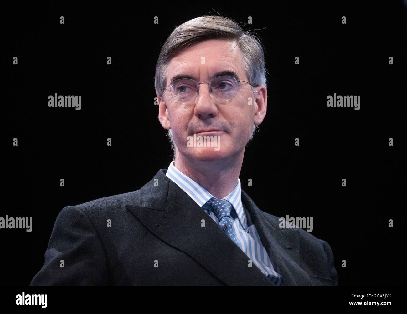Manchester, UK. 4th Oct, 2021. Leader of the Commons, Jacob Rees-Mogg, chats at Conference. A lady outside the conference called him ‘Scum'. Credit: Mark Thomas/Alamy Live News Stock Photo