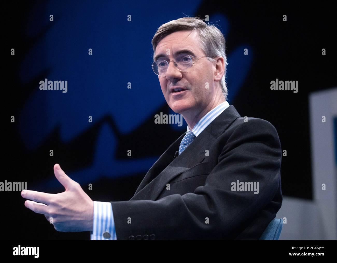 Manchester, UK. 4th Oct, 2021. Leader of the Commons, Jacob Rees-Mogg, chats at Conference. A lady outside the conference called him ‘Scum'. Credit: Mark Thomas/Alamy Live News Stock Photo
