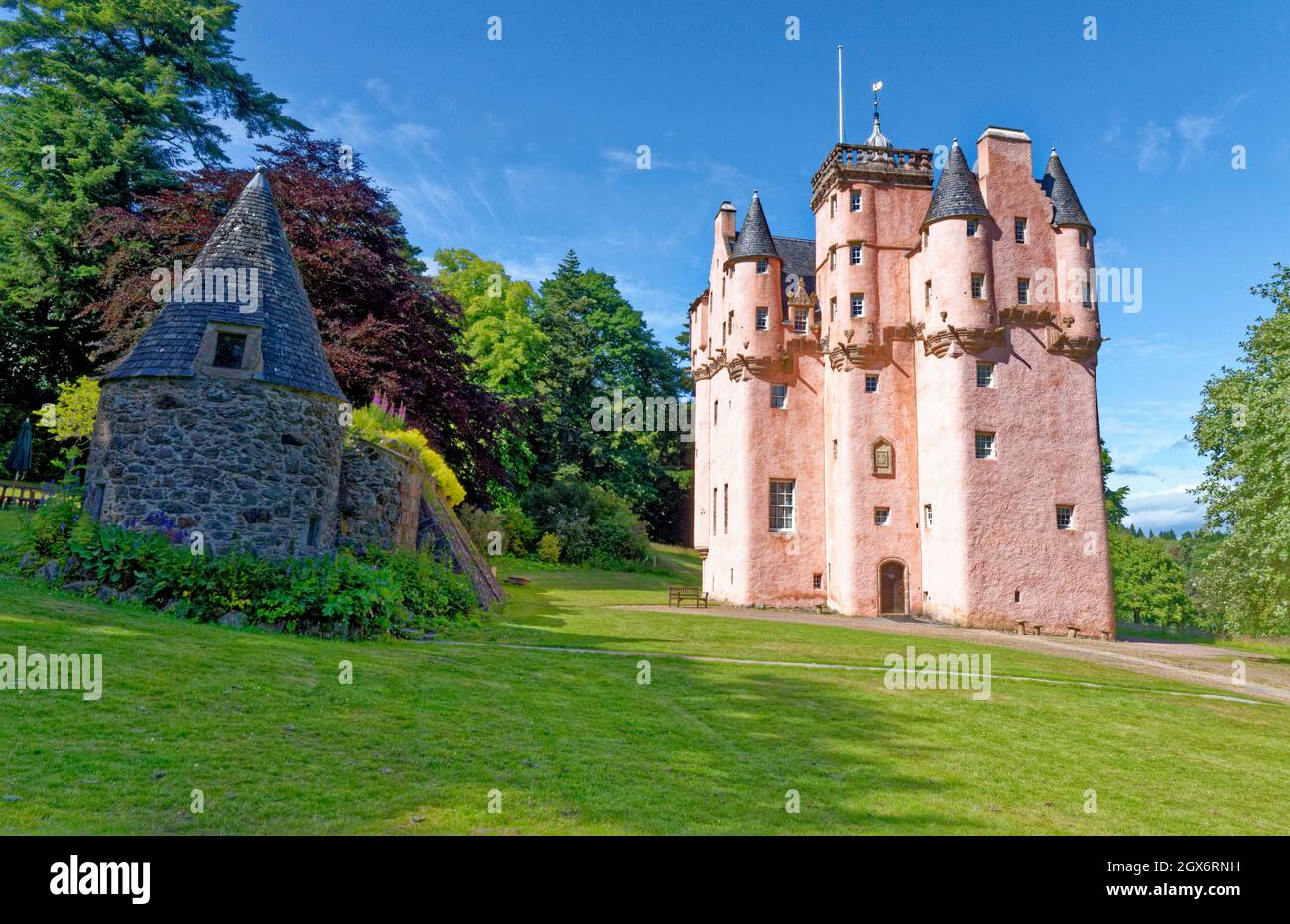Craigievar Castle is a pinkish harled castle or fortified country house