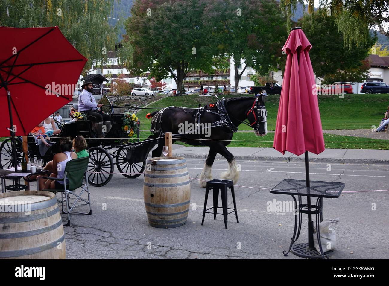 Leavenworth is a Bavarian-styled village in the Cascade Mountains, in central Washington State. Alpine-style buildings with restaurants serving German Stock Photo