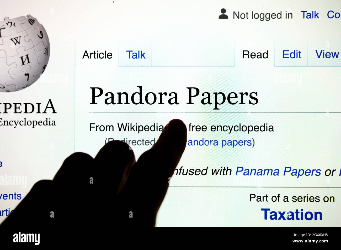 Screen with Wikipedia search Pandora papers. 11.9 million leaked documents  that were published by the International Journalists Stock Photo - Alamy