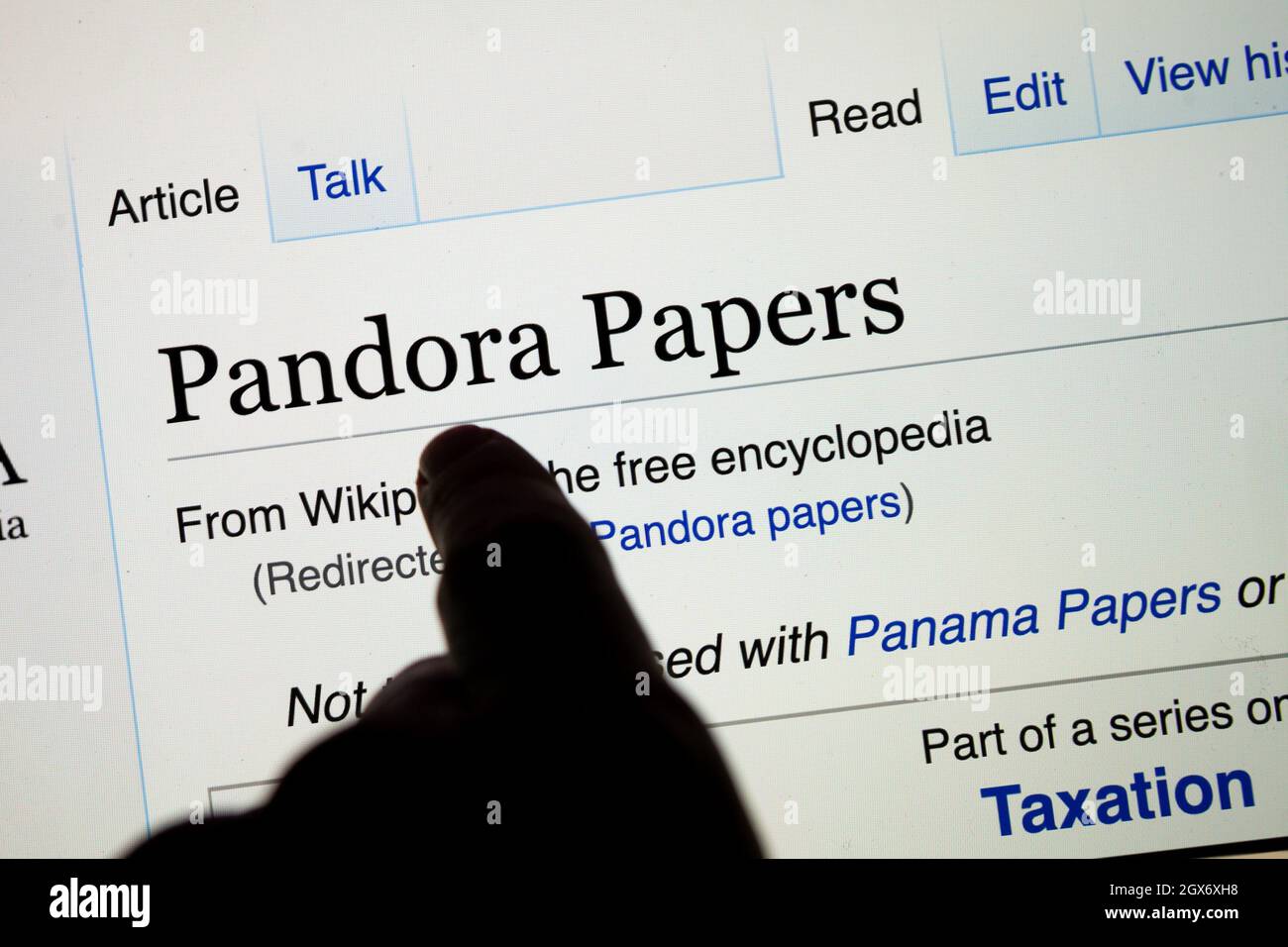 Screen with Wikipedia search Pandora papers. 11.9 million leaked documents  that were published by the International Journalists Stock Photo - Alamy