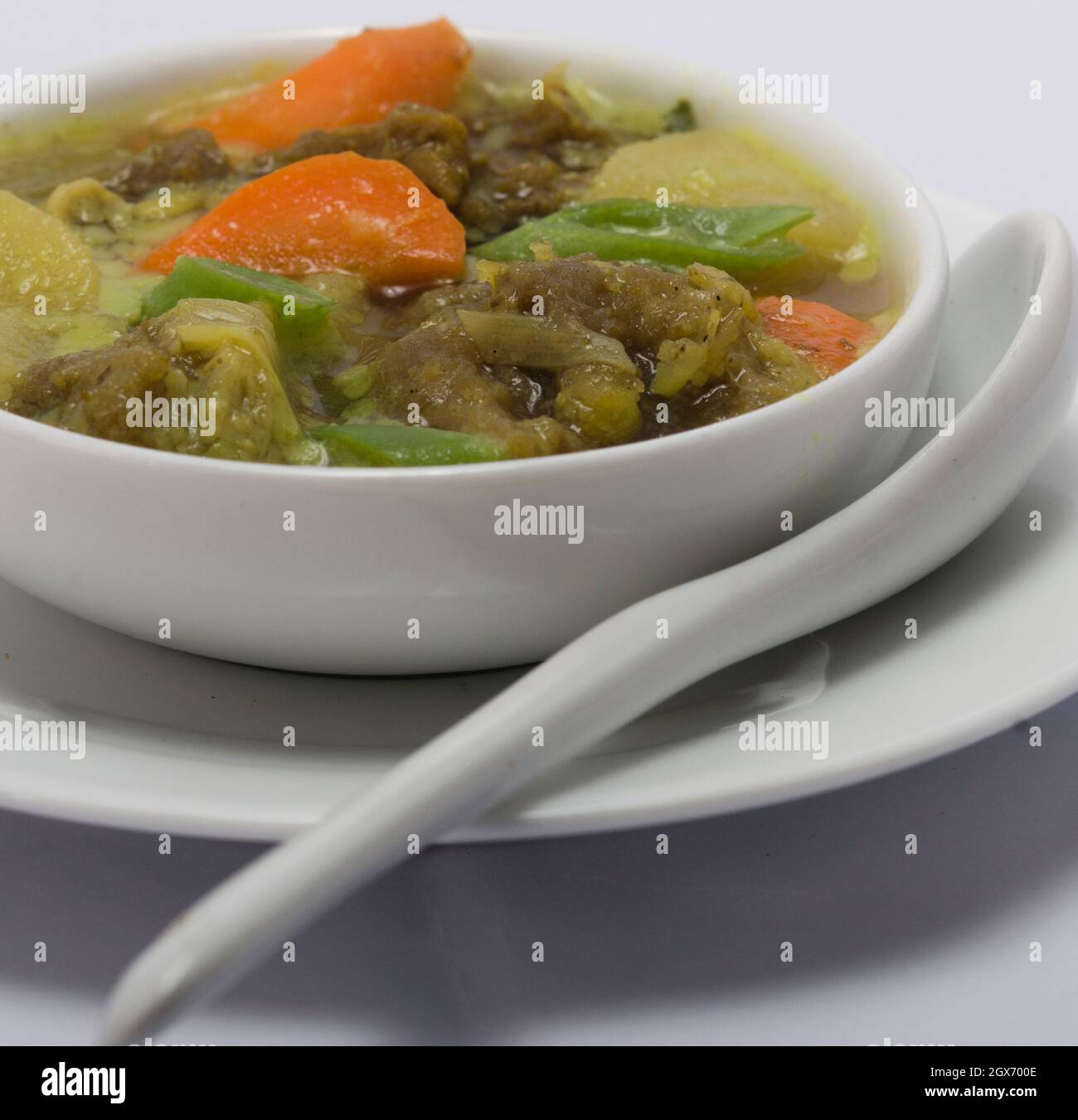 Home-made Beef and Vegetable Soup. on white background. Asian Kitchen