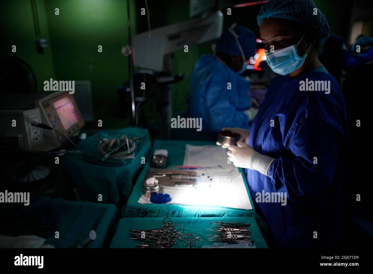 Kathmandu, Nepal. 4th Oct, 2021. A nurse inspects medical equipment ...