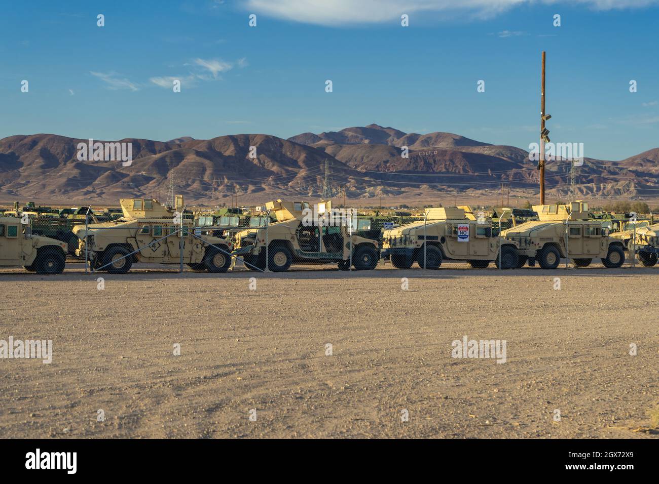 Yermo, CA, USA – July 2, 2021: Military humvee vehicles stored at an auction lot in The Mojave Desert in Yermo, California. Stock Photo