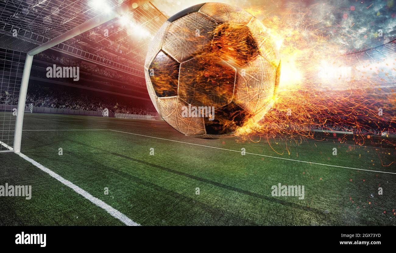 Close up of a fiery soccer ball kicked with power at the stadium