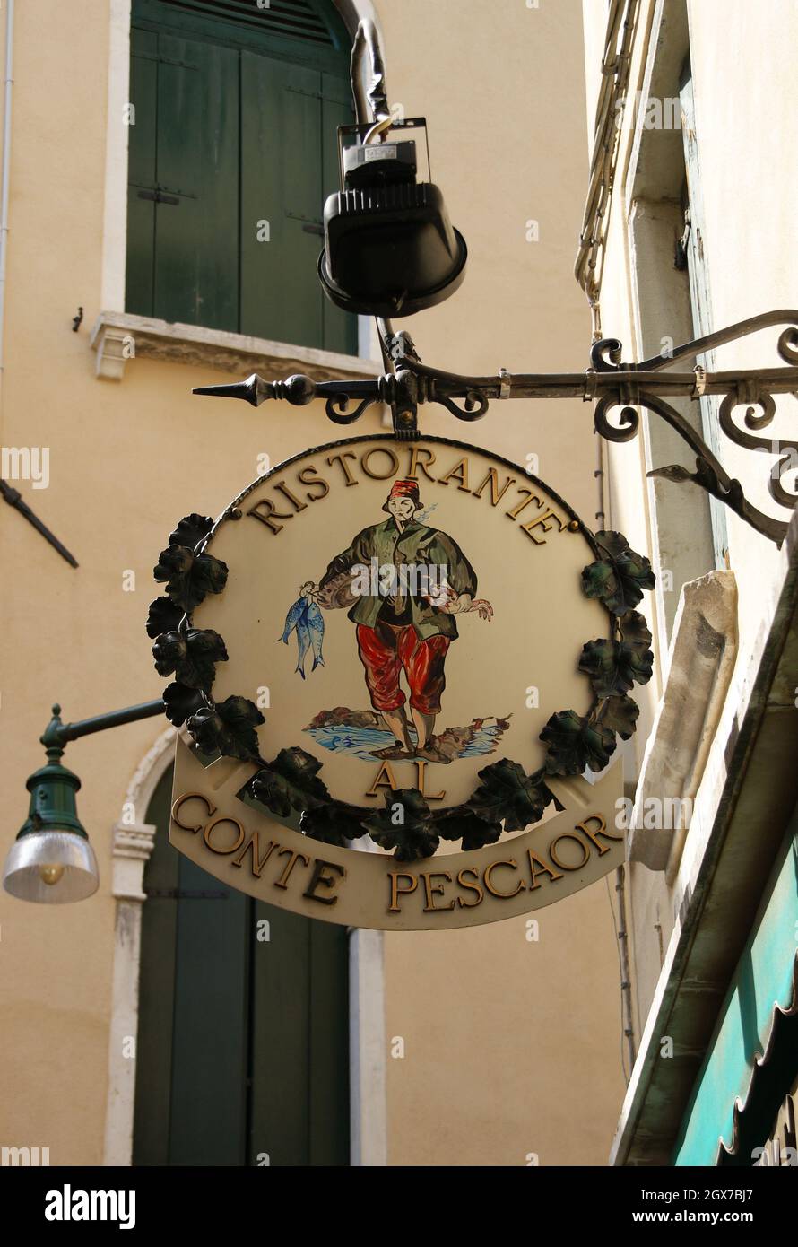 VENICE, ITALY - Aug 01, 2011: A vertical shot of a vintage restaurant sign in Venice, Italy Stock Photo