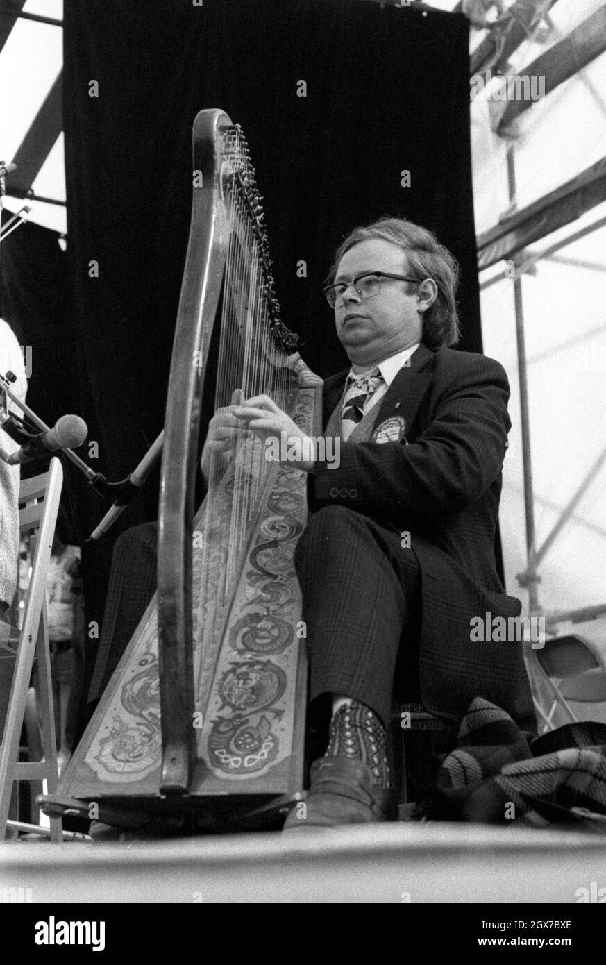 Harpist Derek Bell, MBE performing with The Chieftains at the July Wakes folk festival in Chorley, Lancashire, England on 25 July 1976. Stock Photo