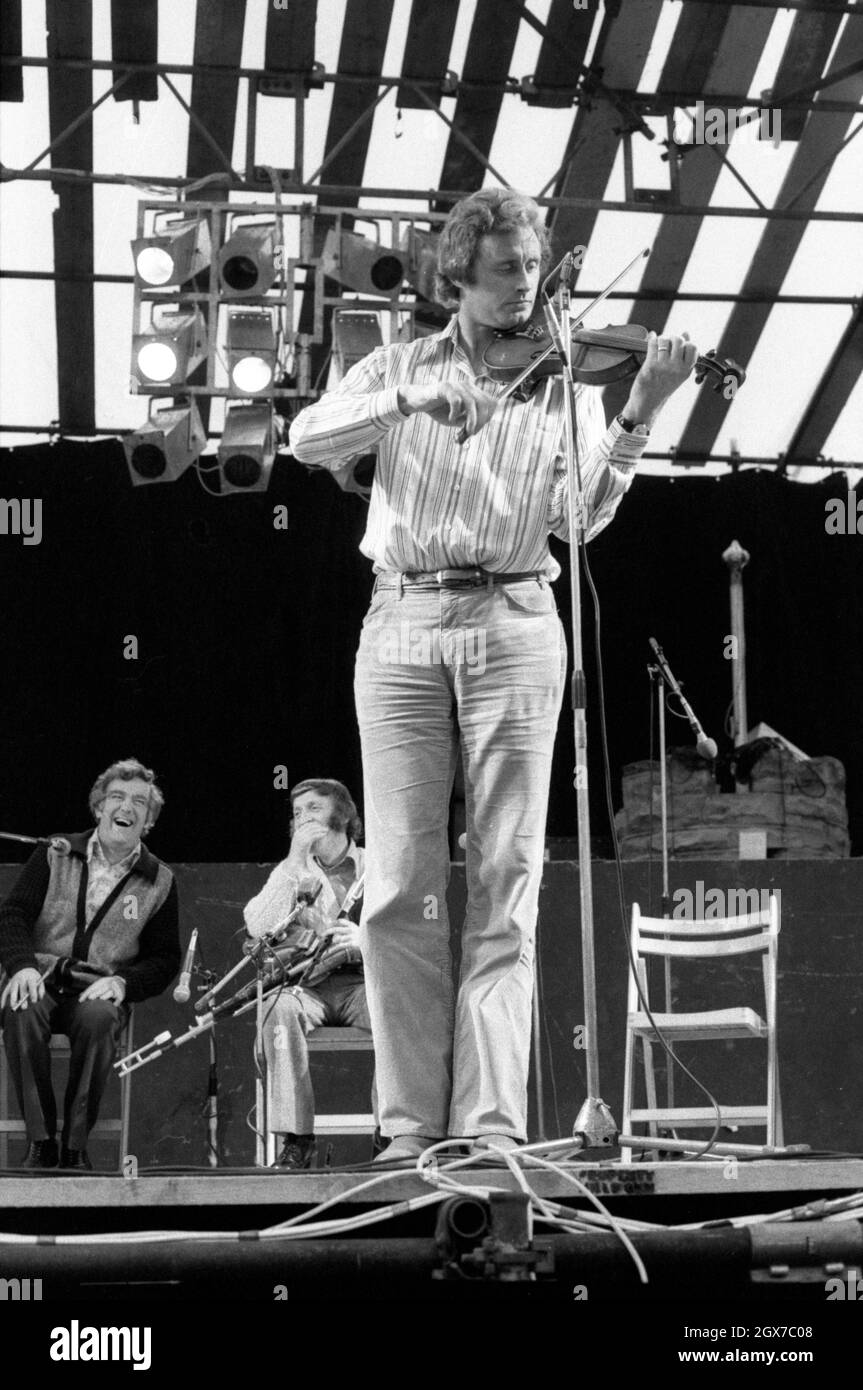 Violonist Seán Keane performing with The Chieftains at the July Wakes folk festival in Chorley, Lancashire, England on 25 July 1976. Stock Photo