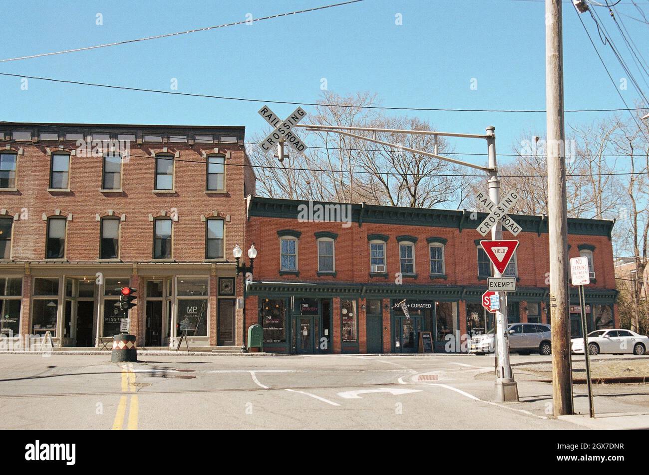 Railroad crossing and brick buildings on Main Street in Beacon, New