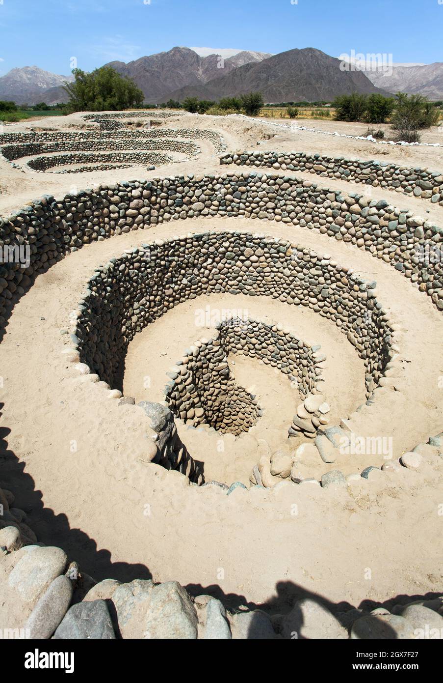 Cantalloc Aqueduct in Nazca or Nazca town, spiral  or circle aqueducts or wells, Peru, Inca architecture and culture Stock Photo