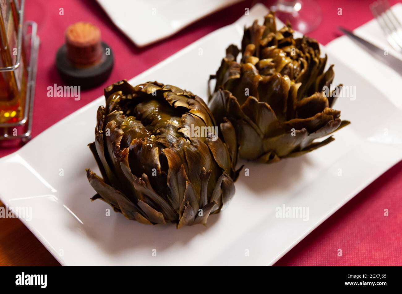 Baked whole artichokes Stock Photo Alamy