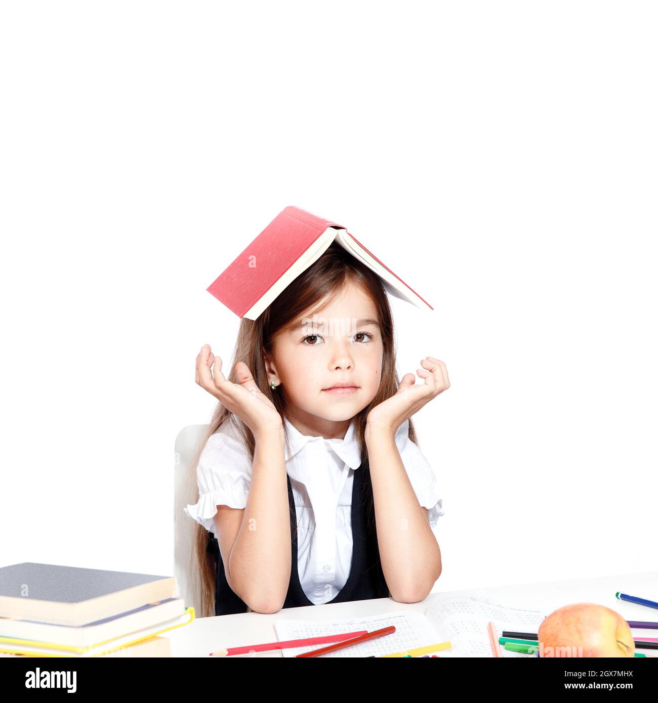 Laughing school girl reading hi-res stock photography and images - Alamy