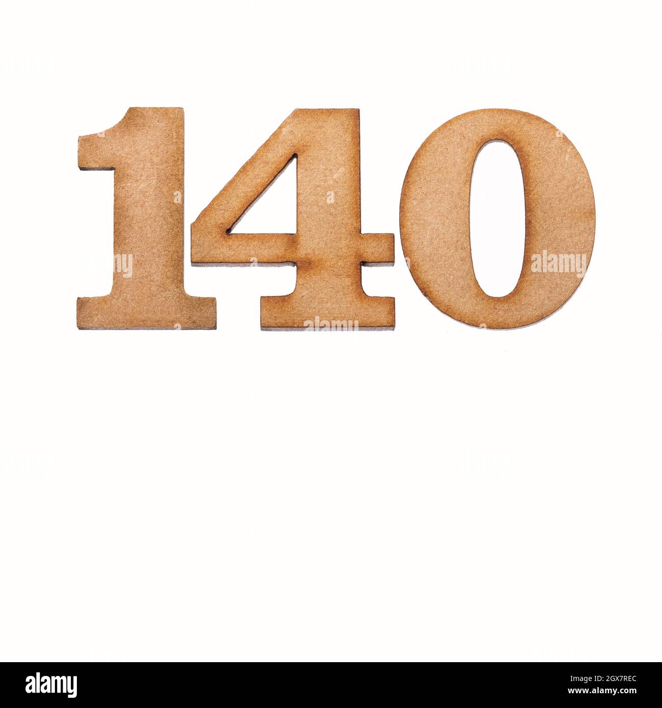 Number 140 in wood, isolated on white background Stock Photo - Alamy