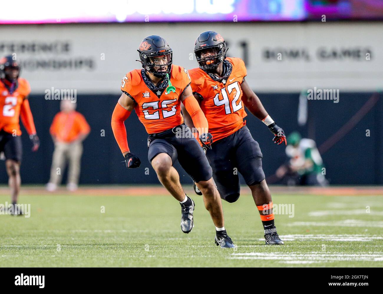 Stillwater, OK, USA. 02nd Oct, 2021. Oklahoma State safety Jason Taylor II (25) and Oklahoma State defensive tackle Jayden Jernigan (42) during a football game between the Baylor Bears and the Oklahoma State Cowboys at Boone Pickens Stadium in Stillwater, OK. Gray Siegel/CSM/Alamy Live News Stock Photo