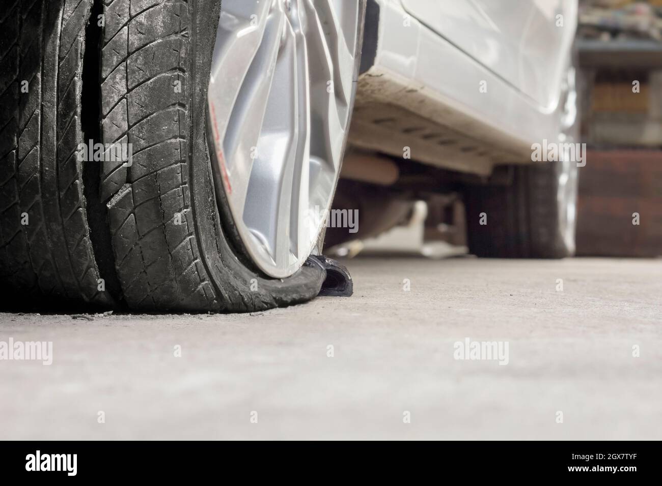 burst tire car Stock Photo Alamy