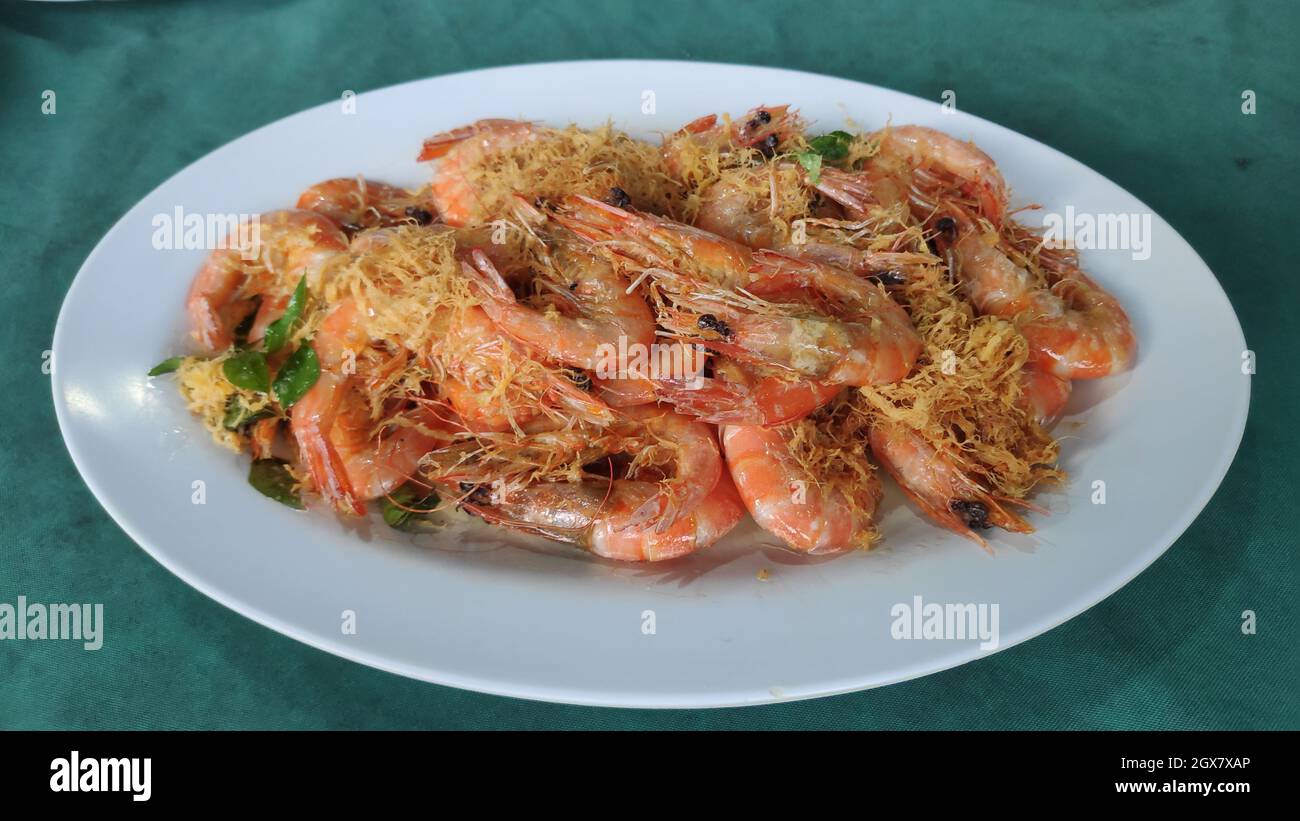 Dry Buttermilk Prawn with egg floss on a plate Stock Photo Alamy