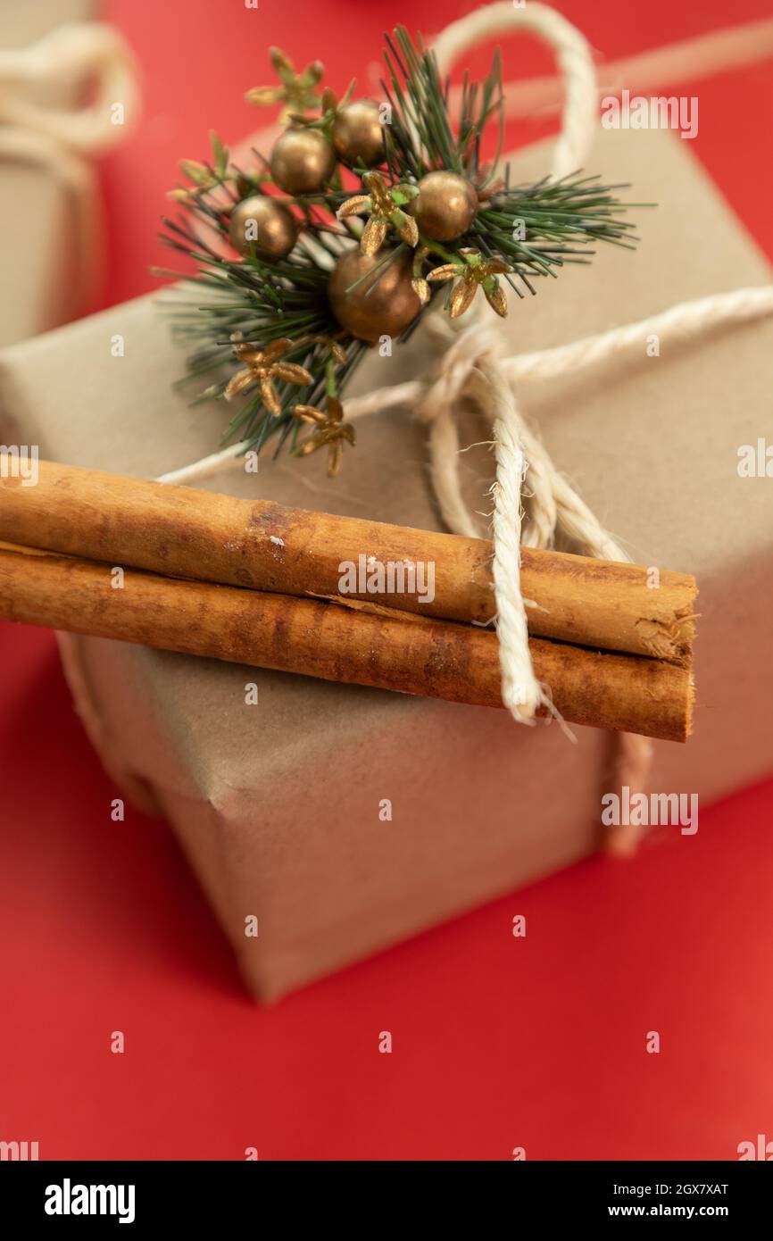 box wrapped with paper, a bow and a small christmas ornament, share on special occasion, gifts in studio Stock Photo