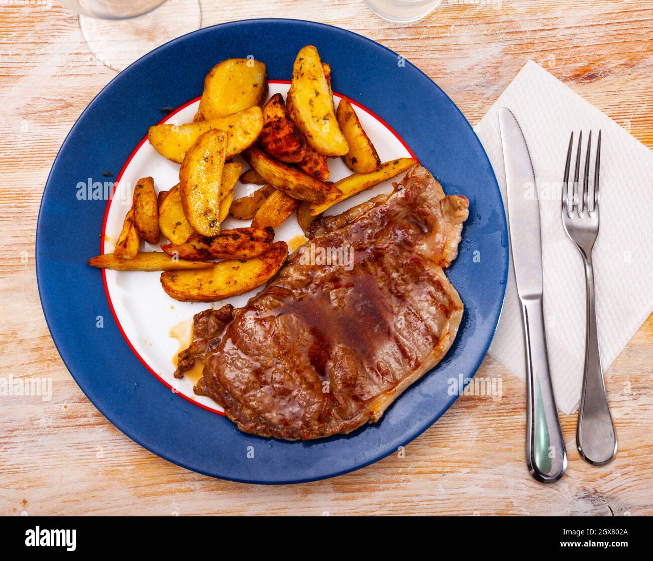 Delicious beef entrecote with fries potatoes Stock Photo Alamy