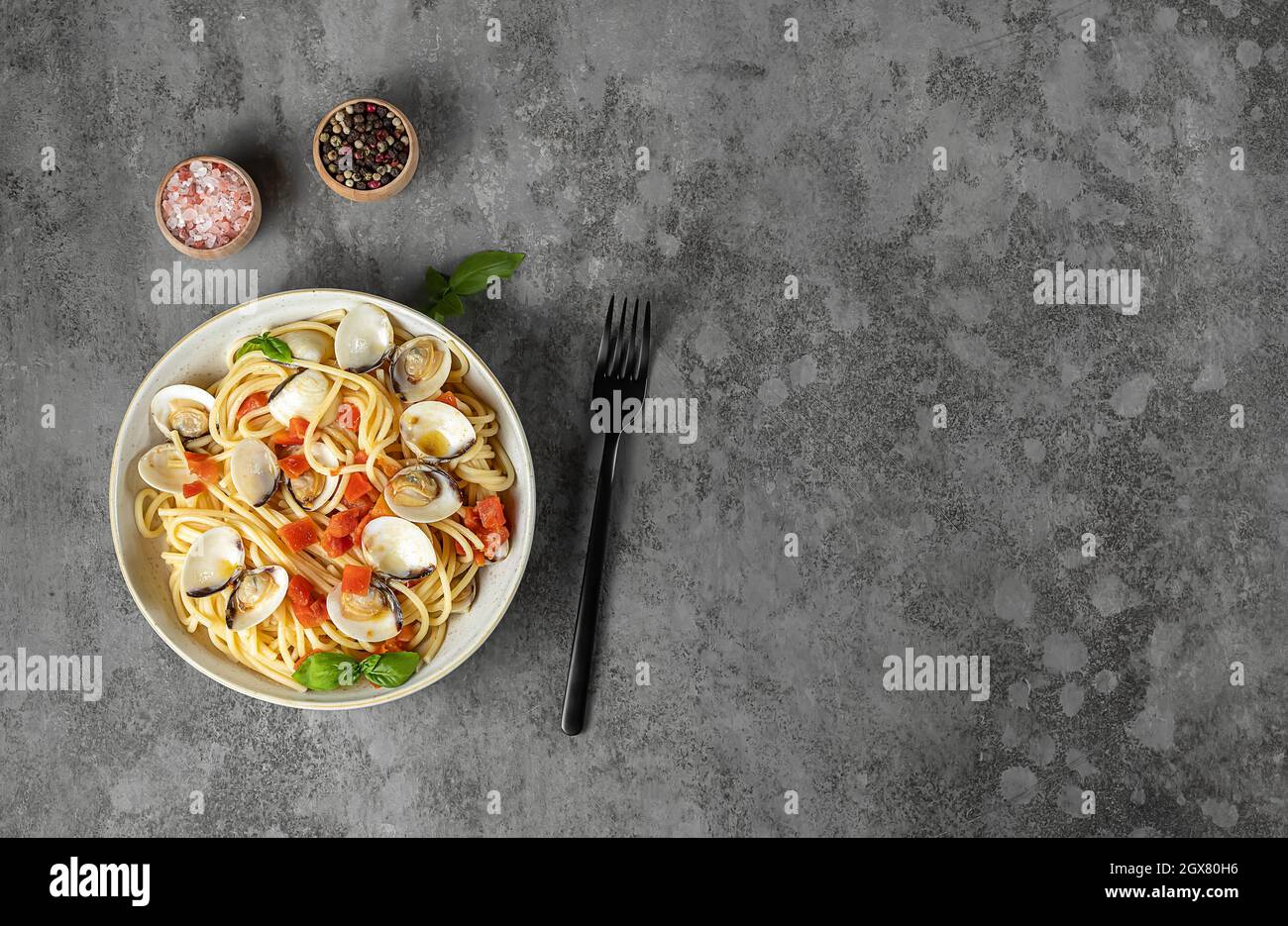 Spaghetti pasta with steamed clams. Fresh cooking Italian seafood