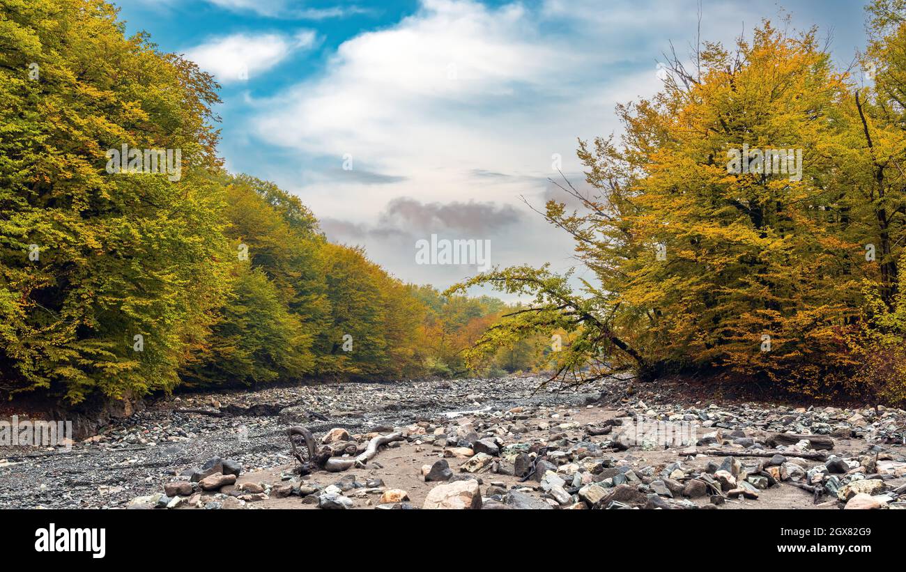 Mountain river bed in autumn season Stock Photo